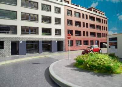Foto eines Details im Architektur-Modellbau (Straßenecke mit Autos)